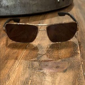 Costa Del Mar sunglasses. Gold rimmed
